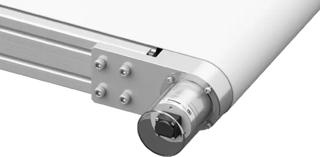An Image of the Encoder Installed in the Drive Unit of the Belt Conveyor Being Protected by a Cover.